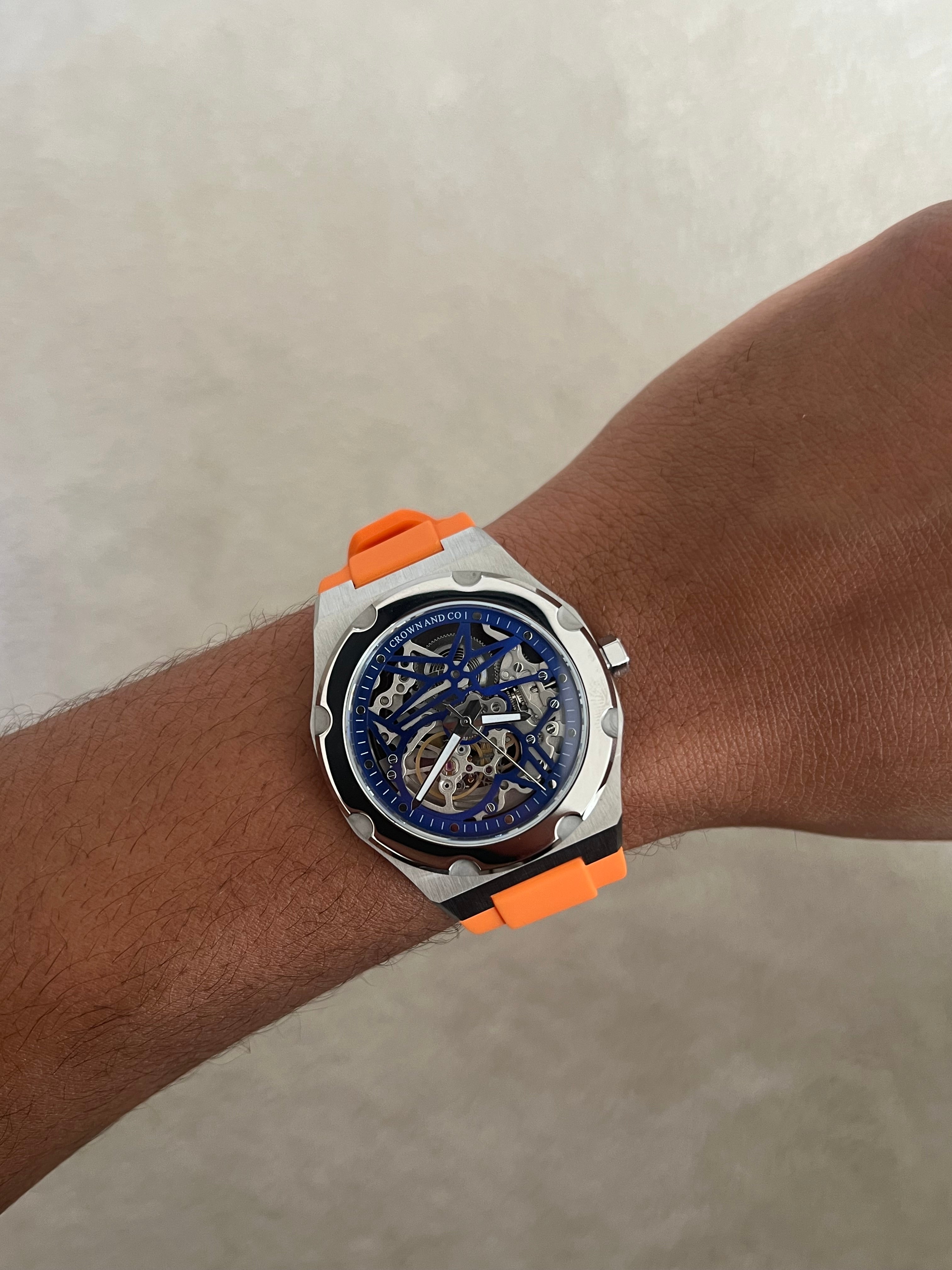 Crown Revolve skeleton blue dial 41 | Orange rubber strap